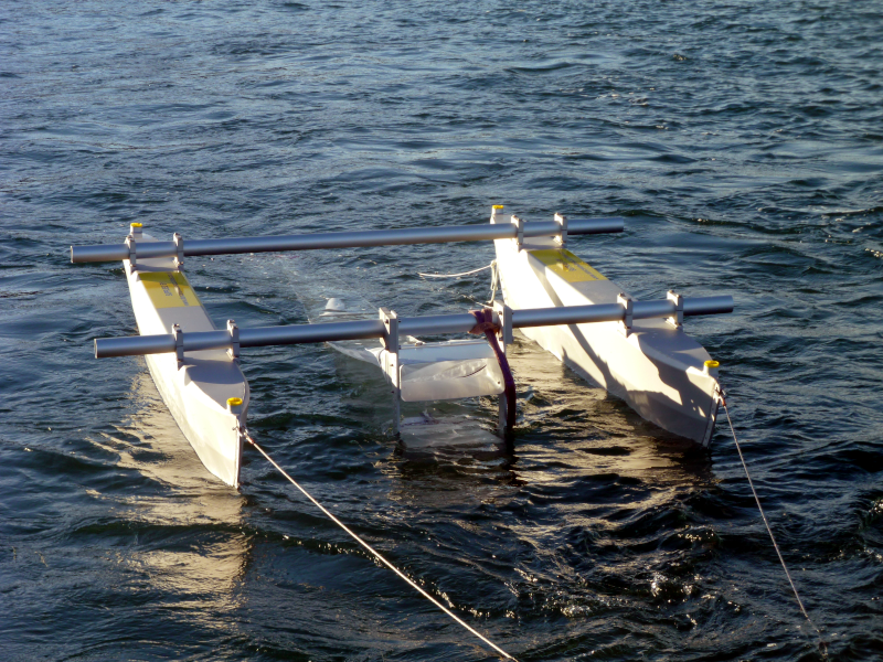 Figure b: Catamaran hulls with sampling net streaming from frame in centre. © Marie Russell / Marine Scotland